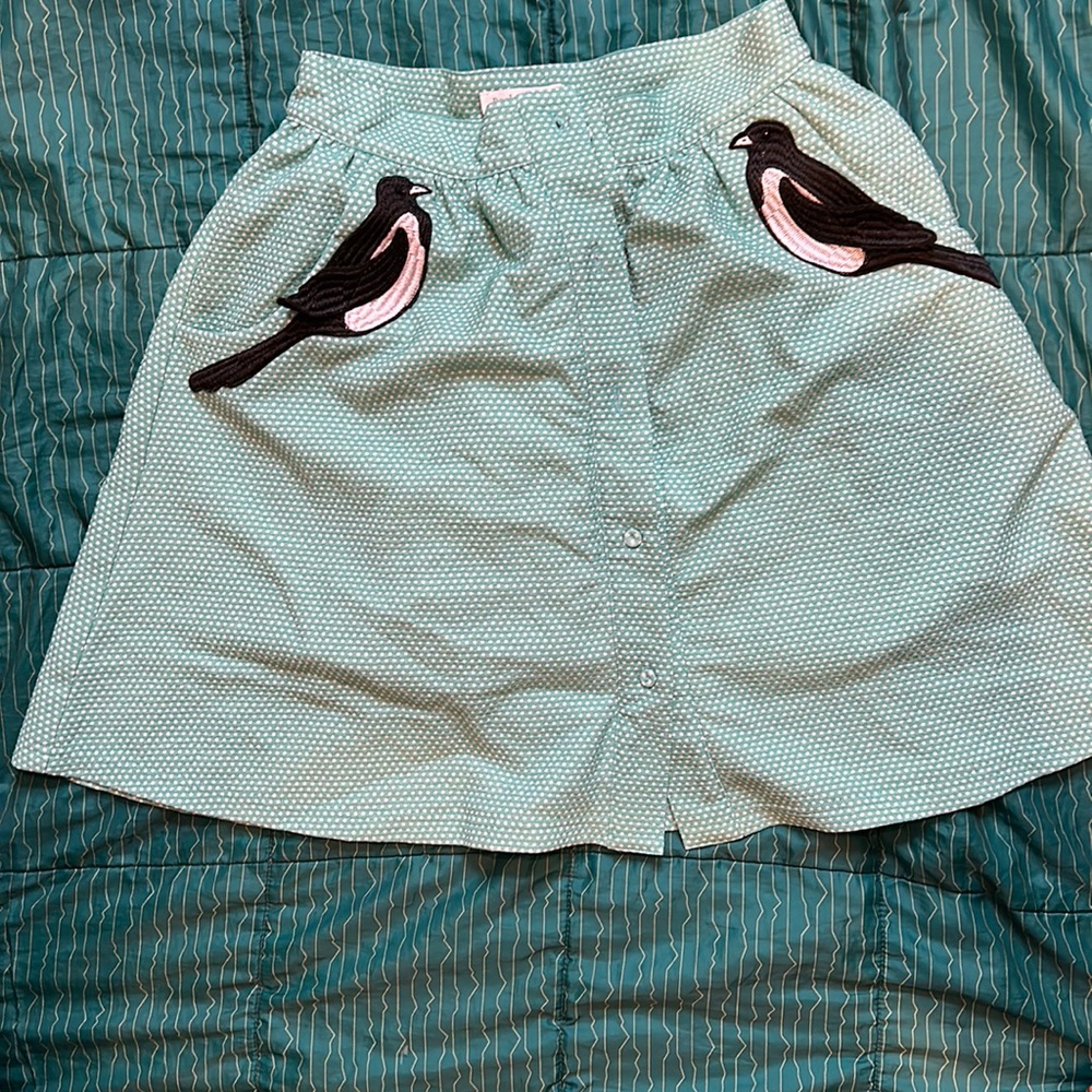 Button front bird pocket